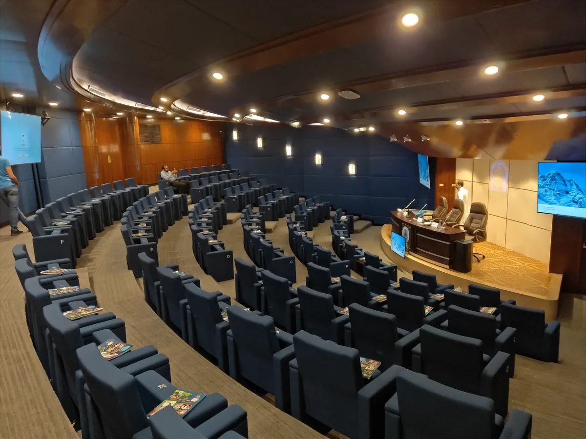 The auditorium seen from the back, with the curved seating and stage