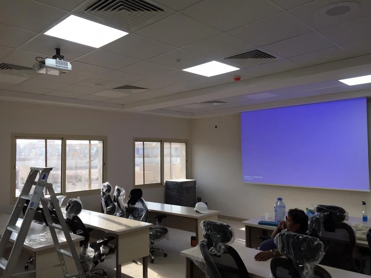 Training room with a projector and screen