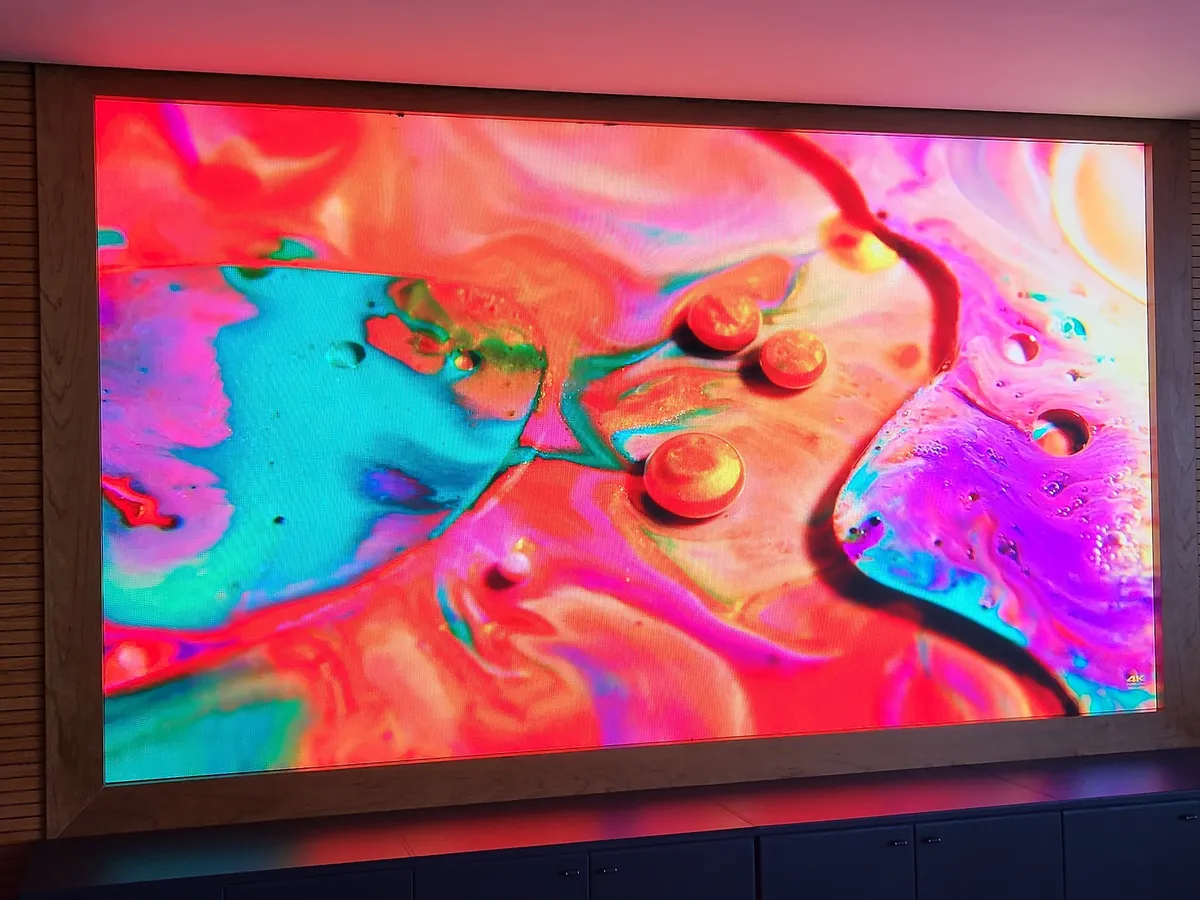 Boardroom LED wall showing colourful test content