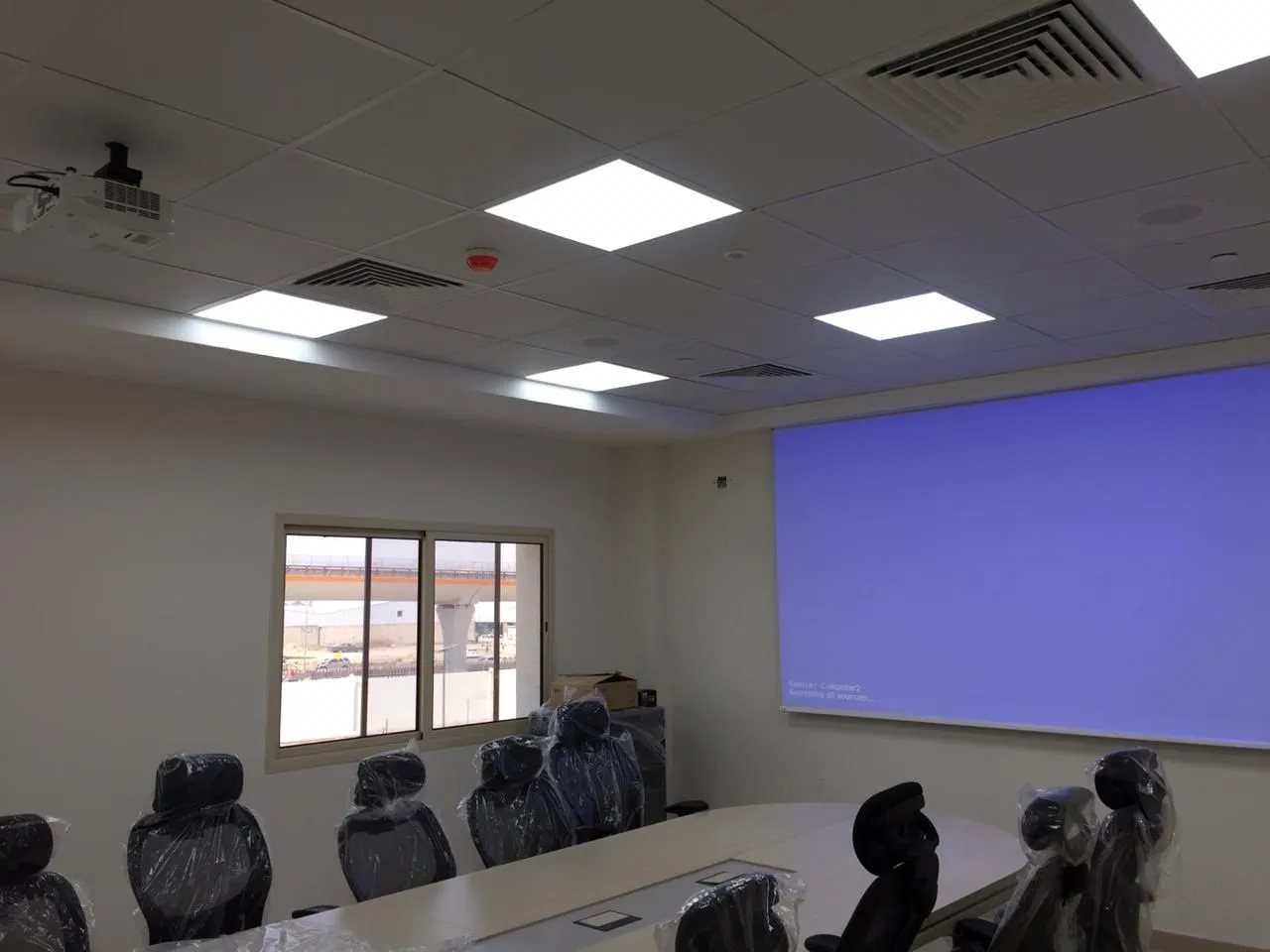 Meeting room with a projection screen