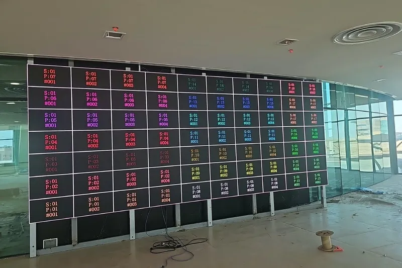 An LED wall showing a cabinet identification test pattern